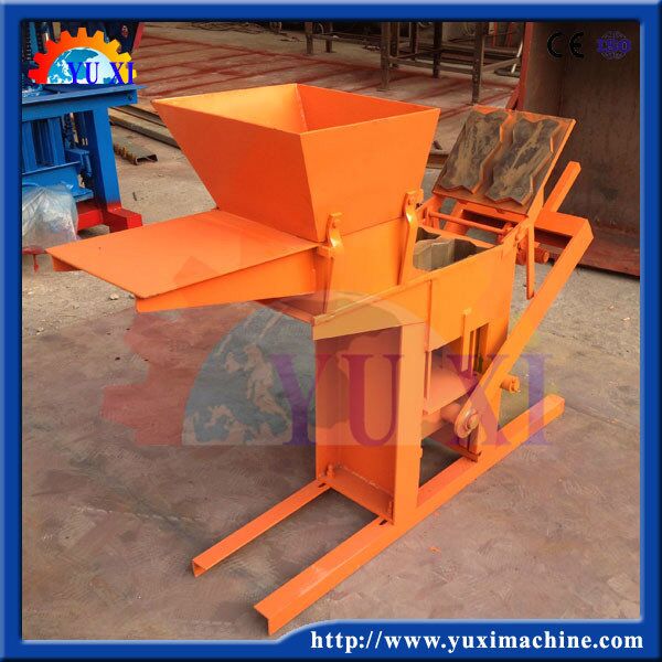 Interlocking brick making machine